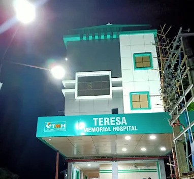 Teresa Memorial Hospital building at night